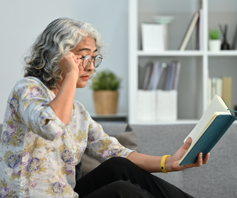 woman reading with glasses